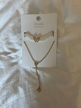 bershka gold-tons butterfly necklace pack of two